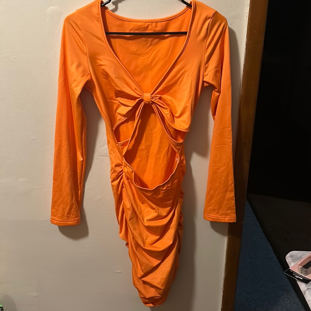 Long sleeve orange dress with cutouts